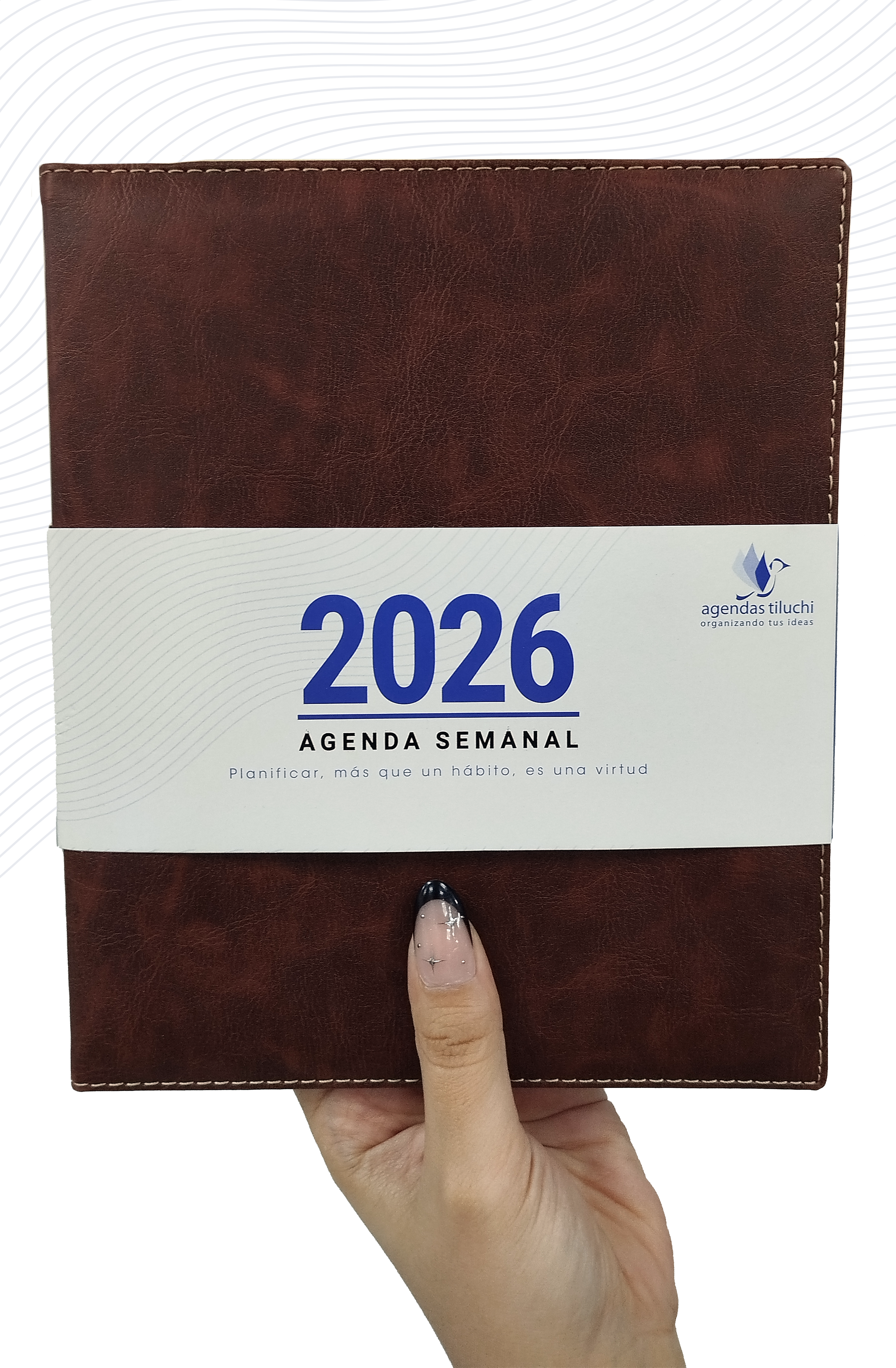 Mano agarrando una agenda...